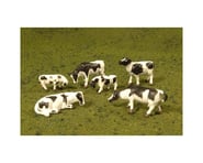 more-results: This is a pack of six O Scale Bachmann SceneScapes Black and White Cows. Populate your